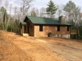 new custom built cabin in woods
